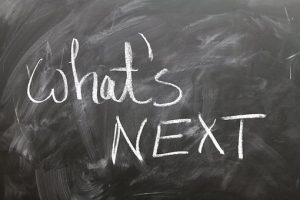 What's Next written on the chalkboard.