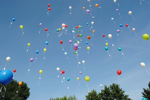 Balloons being released into the air in celebration of winning.